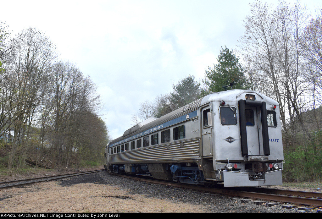 Car # 9167 trails for several yards before it leads the set on the runby